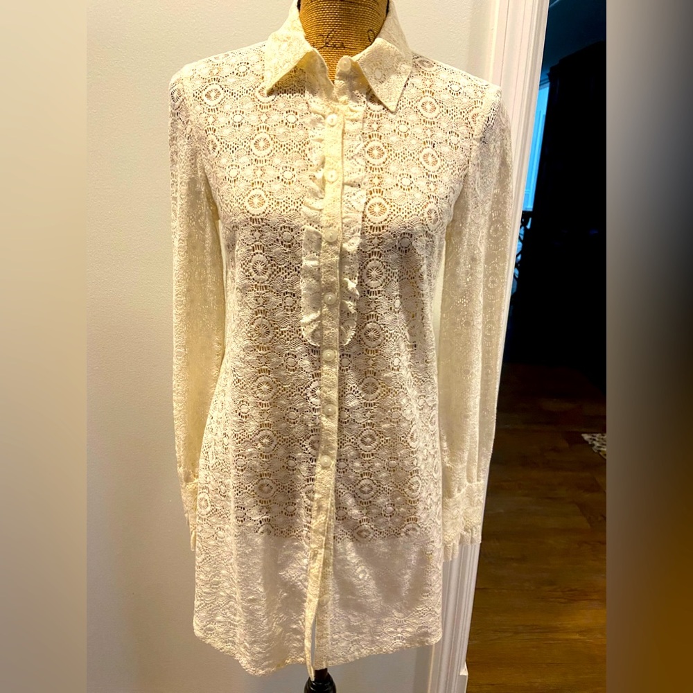Peruvian Connection ivory lace tunic in a size small.